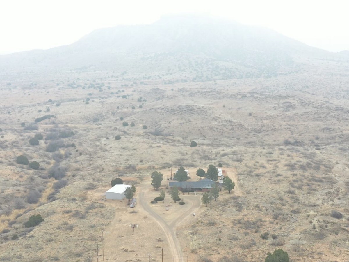 Aerial view of Sunlit Ranch property with mesa