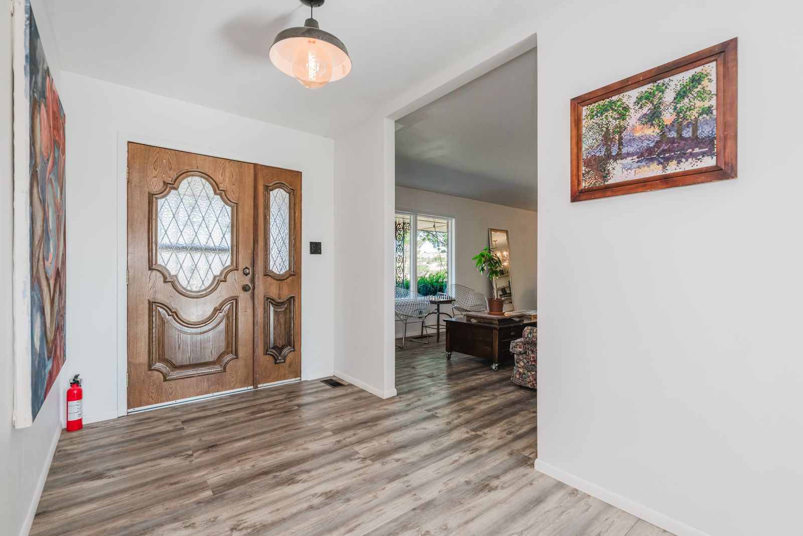 Entryway with carved antique wood door