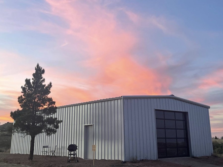 Studio building at sunset with pink sky